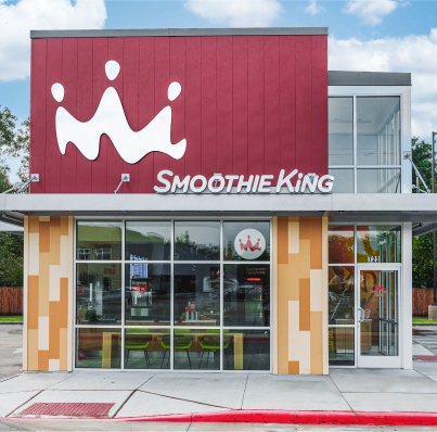 Exterior image of a Smoothie King store during the day